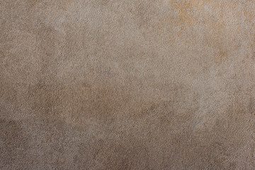 Restored surface of cement plaster on a house wall.