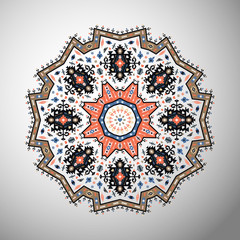Ornamental round colorful geometric pattern in aztec style