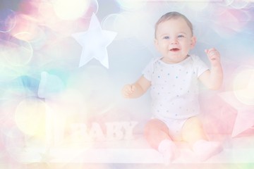 Fototapeta na wymiar toddler child in a bright studio / little boy infant beautiful healthy child