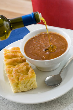 Arabic breakfast with bread, foul modamas with olive oil. close up 