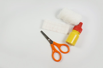 Medical bandages with scissors, antiseptic and sticking plaster. Medical equipment.     