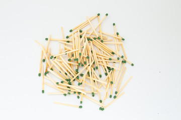 a bunch of matches on a white background