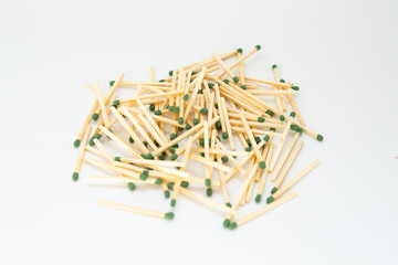 a bunch of matches on a white background