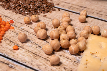
Chickpeas, lentils, and cheese are sources of protein in veganism and vegetarianism. Slimming, keto diet, proper nutrition, and gluten-free cereals.