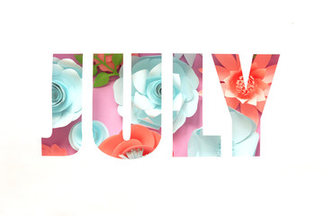 The lettering july, made of paper flowers. Hello, july. Concept of flowering, summer