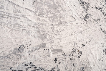 Photo of creative bright textured background in white, grey and black grunge colors, paint and splash drops backdrop