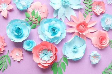 Flower background of multi-colored paper flowers. Handmade