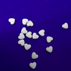 A mound of heart-shaped pills