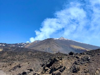 White smoke from the crater of the volcano Etna, Sicily, Italy