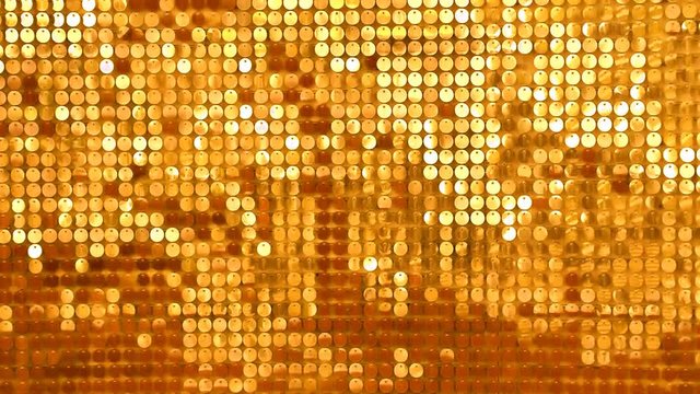 Background from sparkly sparkles sparkling in the wind. Sparkling glitter background, sequins texture bokeh with iridescent luster