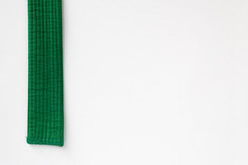 Zen art. green belt martial arts on white background. Substrate for diplomas, posters, sites on...