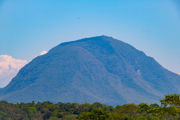 mountain jungle landscape with blue sky