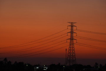 Fototapeta premium High voltage pole pictures During Twilight Life There is beautiful light. Suitable for use as illustrations of content.