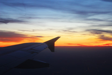 Bright sunrise from the airplane window