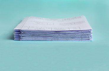 Stack Folding architecture drawings on a blue background. Copy space