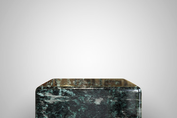 Empty dark green marble podium on white background. Best for product presentation. 3d rendered cube pedestal.