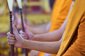 The hand of the Monks holding talipot fan