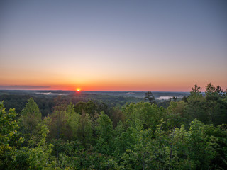 Fototapeta premium Sunrise from scenic overlook near Cheaha Mountain State Park in Talladega National Forest in Alabama, USA