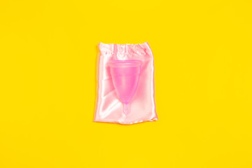 Menstrual cup. Eco-friendly life - organic made recycle things replace polymers, plastics analogues. Home style, natural products for recycling and not harmful to the environment and health.