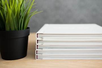 stack of books and pen