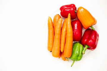 yellow and red peppers isolated on white
