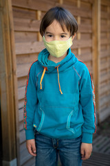 Child with face mask