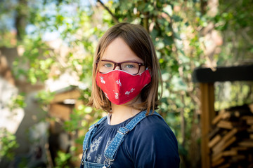 Child with face mask