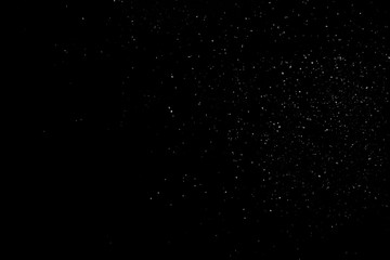 Isolated Dust Dirt Particles Salt Snow Powder Spray. Authentic Black Rough Grunge Distressed Overlay Texture Surface. 