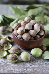 Walnuts in a bowl. Green walnuts. Harvest walnuts.
