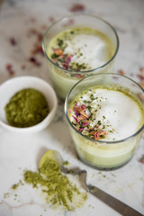 Matcha latte with milk foam. Japanese tea ceremony setting