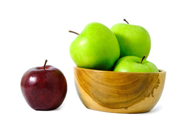Group of green and red Apple fruit on a wooden bowl / basket isolated on white background