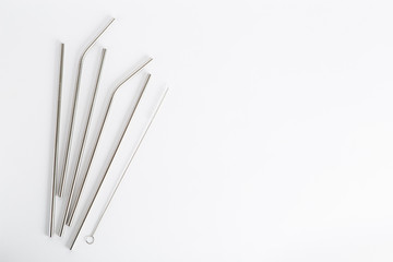 Reusable metal straws for the drinks with a cleaning brush