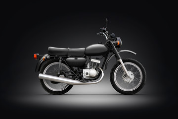 Fototapeta na wymiar Classic motorcycle black background photo