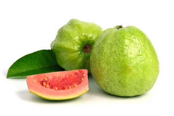 Fresh Psidium guajava / common guava / lemon guava sliced and raw fruit isolated on a white background