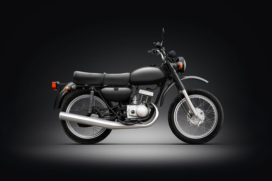 Classic motorcycle black background photo