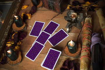 Tarot cards and esoteric concept. Magic rituals. Mystical table with details, 