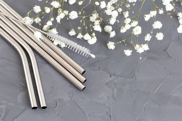 Reusable metal straws for the drinks with a cleaning brush