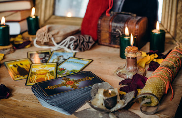 Tarot cards and esoteric concept. Magic rituals. Mystical table with details, 