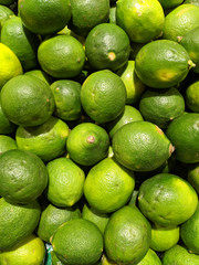 the green lemons shows in the supermarket