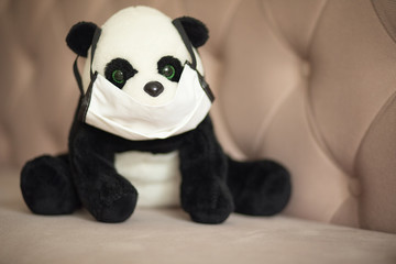  plush toy panda in a medical mask © DARYA STSIAPANAVA