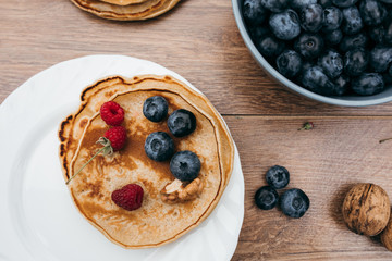 Pankeys with berries on the plate