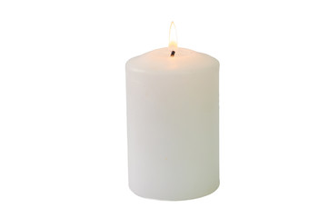 Fototapeta na wymiar A burning candle isolated on a white background