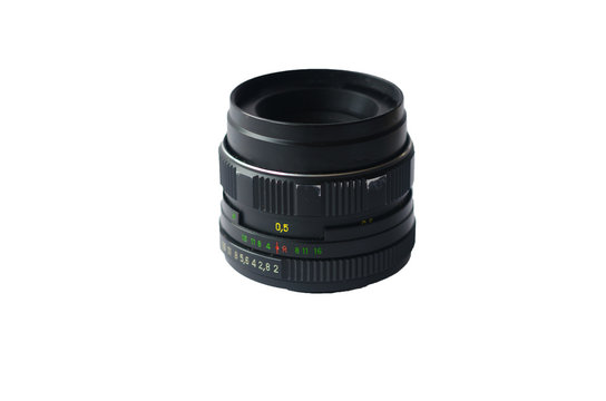 The old camera lens is isolated on a white background