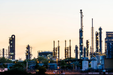Exhaust systems of the chemical industry against the evening sky