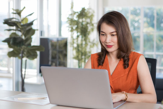 Woman Workin From Home Using Computer.