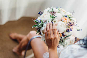 bride holding wedding bouquet