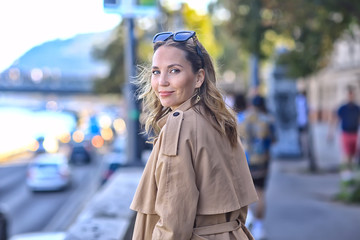 Fototapeta premium spring portrait of a girl with beautiful bokeh, happy beautiful woman on a walk