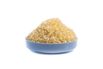 Brown sugar isolated on white