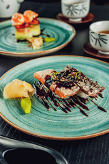 Fototapeta na wymiar Japanese food eel sushis on a rustic green dish
