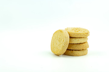 Premium butter cookies isolated on white background with copy space. Shallow depth of field.